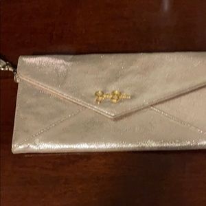 Gold Jessica Simpson wristlet